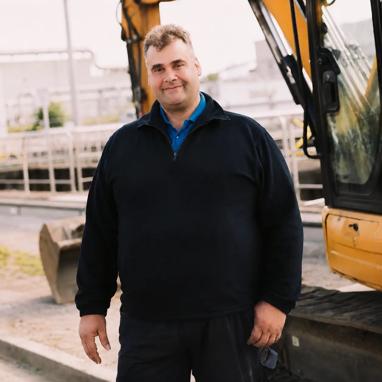 Thomas, construction foreman and founder of FALKN, standing on a construction site before creating the FALKN brand.